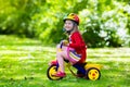 Little girl riding a tricycle Royalty Free Stock Photo