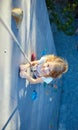 Little girl in rock climbing gym Royalty Free Stock Photo