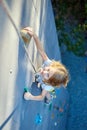 Little girl in rock climbing gym Royalty Free Stock Photo