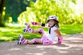 Little girl with roller skate shoes in a park Royalty Free Stock Photo