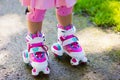 Little girl with roller skate shoes in a park Royalty Free Stock Photo