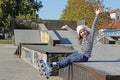 Little girl with rollerskates fun on playground