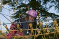 Little girl in rope park