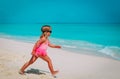 Little girl run to swim at beach, child enjoy sea Royalty Free Stock Photo