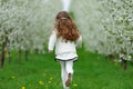 little girl running in the garden Royalty Free Stock Photo