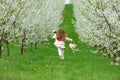 little girl running in the garden Royalty Free Stock Photo