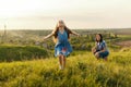 Little girl running on meadow