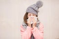 Little girl with runny nose wipes her nose Royalty Free Stock Photo