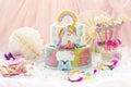 Little girl`s birthday party; dessert table with unicorn cake, cake-pops, sugar cookies and birthday decoration Royalty Free Stock Photo