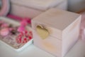 Little girl`s jewelery box on a white