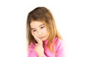 Little girl with sad face holds her cheek with hand - tooth hurts. Ear pain, toothache, swollen cheek and gums, problems of