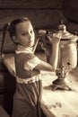Little girl with samovar Royalty Free Stock Photo