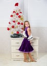 Little girl satisfied christmas gift. Best gift ever. Happy new year concept. Got gift exactly she wanted. Figure Royalty Free Stock Photo