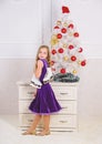 Little girl satisfied christmas gift. Best gift ever. Happy new year concept. Got gift exactly she wanted. Figure Royalty Free Stock Photo