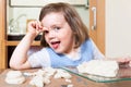 Little girl sculpts dough toys