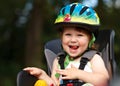 Little girl in the seat bicycle Royalty Free Stock Photo
