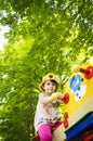 Little girl on seesaw/teeter-totter