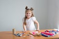 little girl sewing things by herself Royalty Free Stock Photo