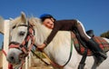 Little girl and shetland pony