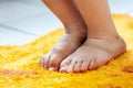 Little girl showing her dirty feet Royalty Free Stock Photo