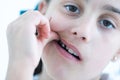 little girl showing her healthy teeth at dental office, smiling and waiting for a checkup. Early prevention Royalty Free Stock Photo