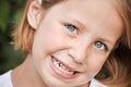 Little girl showing her white teeth Royalty Free Stock Photo