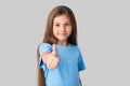 Little girl showing thumbs up Royalty Free Stock Photo