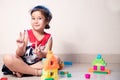 Little Girl showing Winning Sign in fight against Coronavirus