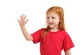 A little girl shows gesture - five fingers, isolated on white background Royalty Free Stock Photo