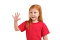 A little girl shows gesture - five fingers, isolated on white background Royalty Free Stock Photo