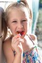 Little girl shows his orthodontic appliance