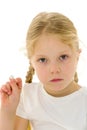 A little girl shows the pill that the doctor prescribed for her. Virus, disease, covid-19 concept.