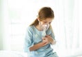 Little girl is sick, using inhaler and heart ache in hospital wa Royalty Free Stock Photo
