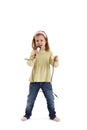 Little girl singing with microphone Royalty Free Stock Photo