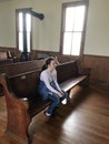 Little Girl in Church Pew Royalty Free Stock Photo