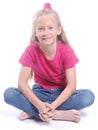 Little girl sitting cross-legged