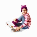 The little girl sitting on ice in ice skating. Isol Royalty Free Stock Photo