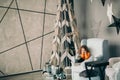 little girl sitting in the living room near a stylized Christmas tree. Royalty Free Stock Photo