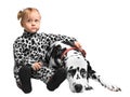 Little girl sitting near the Dalmatian dog Royalty Free Stock Photo