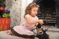 Little girl sitting next to a vintage  telephone Royalty Free Stock Photo