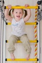 Little girl is sitting on the stairs Royalty Free Stock Photo