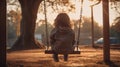 A little girl sitting on a swing at sunset, AI Royalty Free Stock Photo