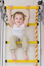 Little girl is sitting on top of the stairs Royalty Free Stock Photo