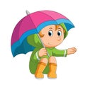 The little girl is sitting under the umbrella and checking the rain Royalty Free Stock Photo