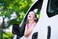 Little girl sitting in white car Royalty Free Stock Photo