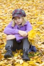 Little girl sittingin the park Royalty Free Stock Photo