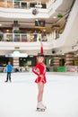 Little girl skates figure skating victory sports suit Royalty Free Stock Photo