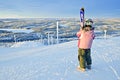 Little girl-skier on the hill