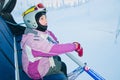 Little girl-skier on the ski lift Royalty Free Stock Photo