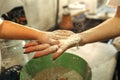 The little girl slapped her hand with flour Royalty Free Stock Photo